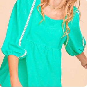MINT BABYDOLL PEPLUM BUBBLE SLEEVE POM POM TOP